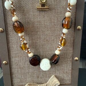 Elegant Beaded Necklace with Amber and Cream Accents